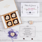 Top view of 4-piece elegant wedding invitation chocolate box