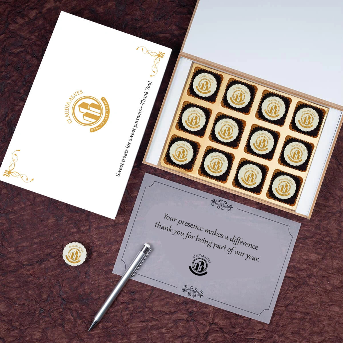 Variety mix of logo‑printed chocolates in black/white wooden box