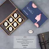 Open Women’s Day chocolate box showing message card placement