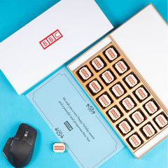 Elevate your corporate gifting with chocolates featuring your logo and name.