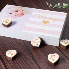 Welcome your little angel with chocolates featuring their name.