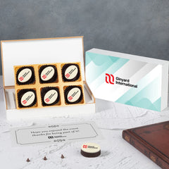 Event‑themed wooden box filled with branded chocolates