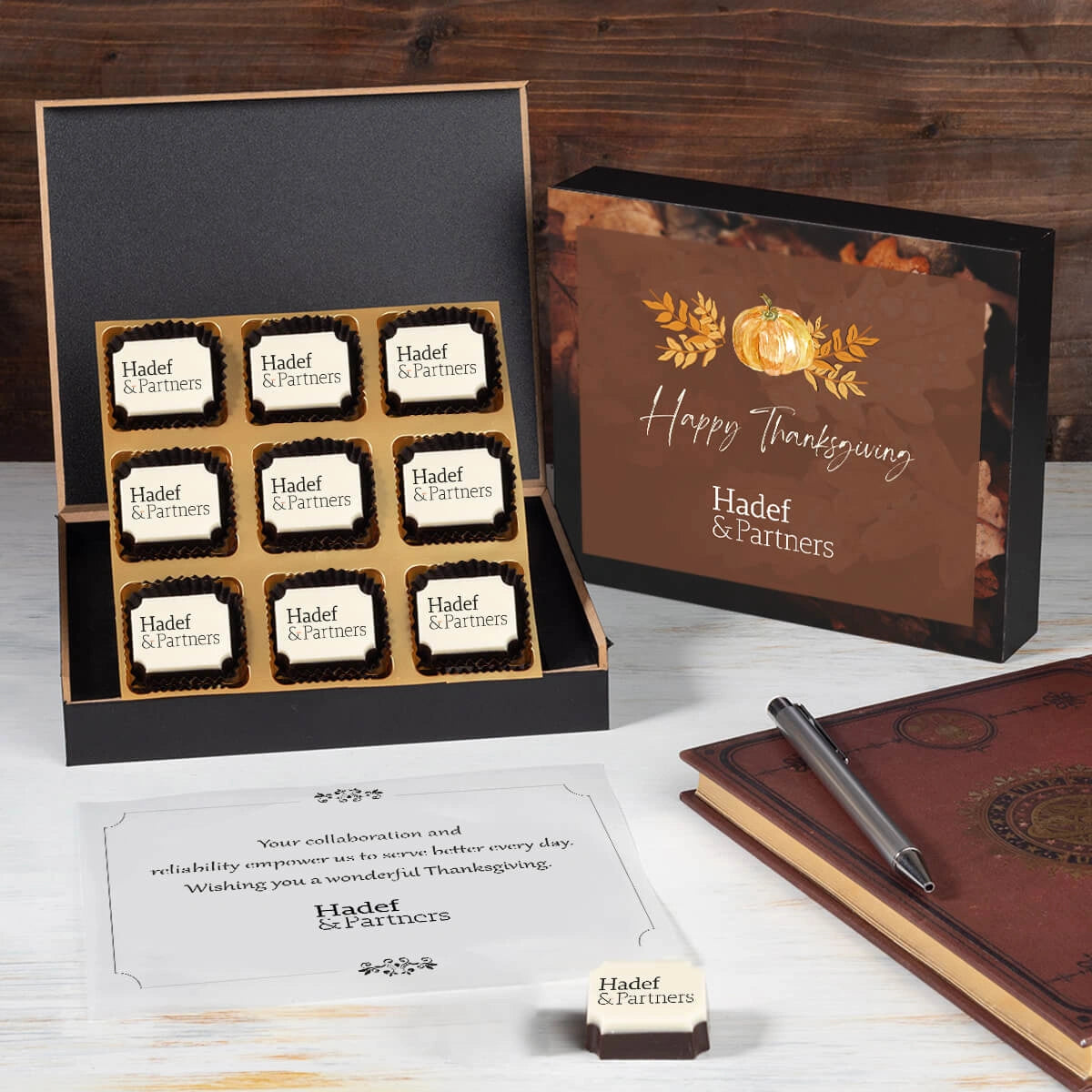Open view of 9 chocolate corporate Thanksgiving gift box with custom printed designs