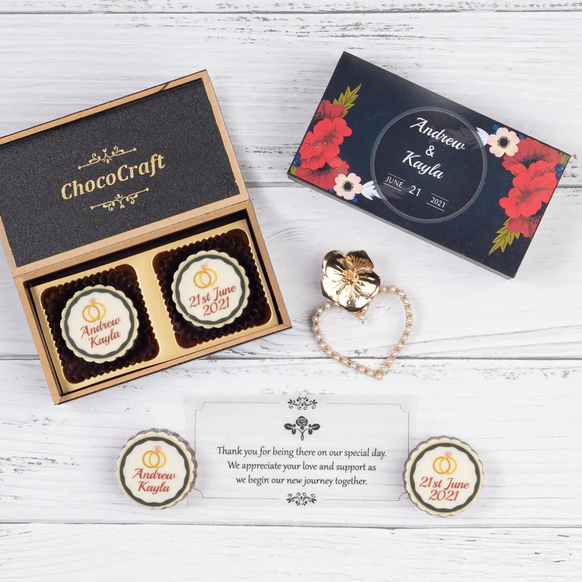 Wedding favors shop sample in a 2-chocolate black wooden box with custom wedding design
