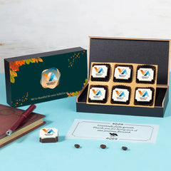 Spread view of chocolate pieces in corporate gift box