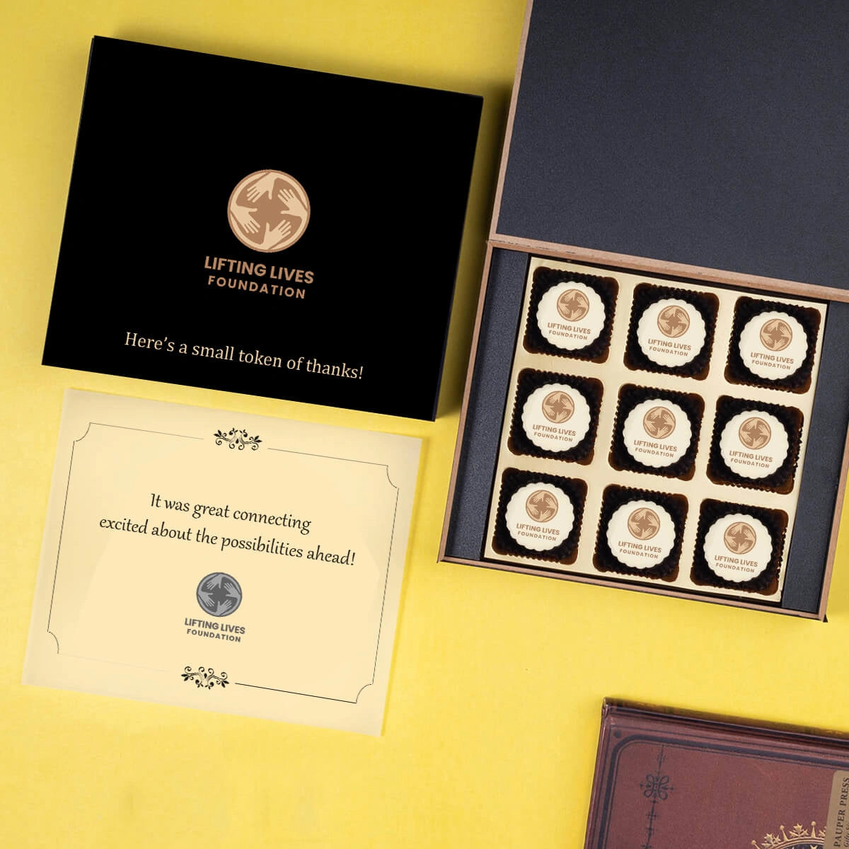 Premium 9-piece corporate chocolate presentation in white wooden box