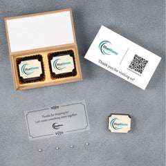 Two‑piece giveaway box with branded chocolates