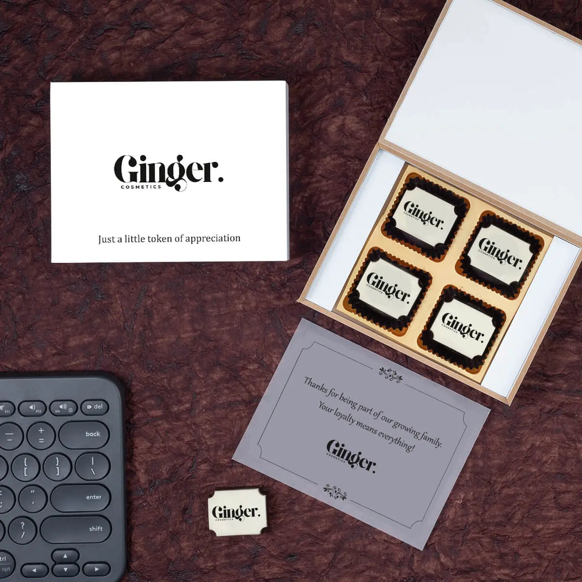 Closed box with engraved logo and thank you message