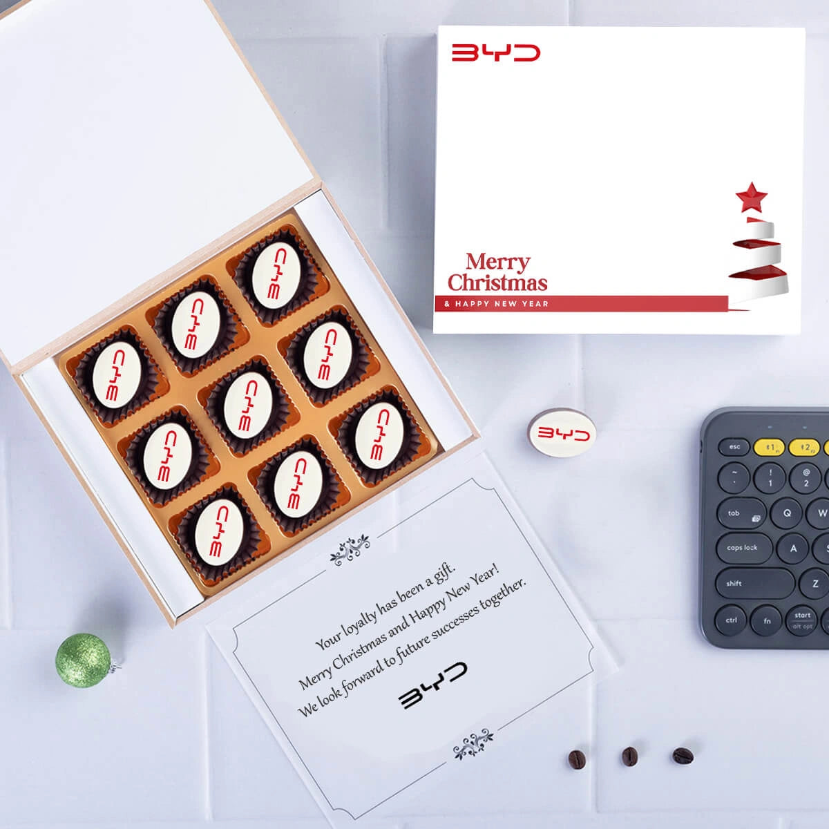 Company holiday gift featuring 9 custom chocolates for clients