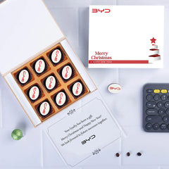 Company holiday gift featuring 9 custom chocolates for clients