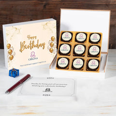 Corporate birthday gift box and chocolate pieces with logo