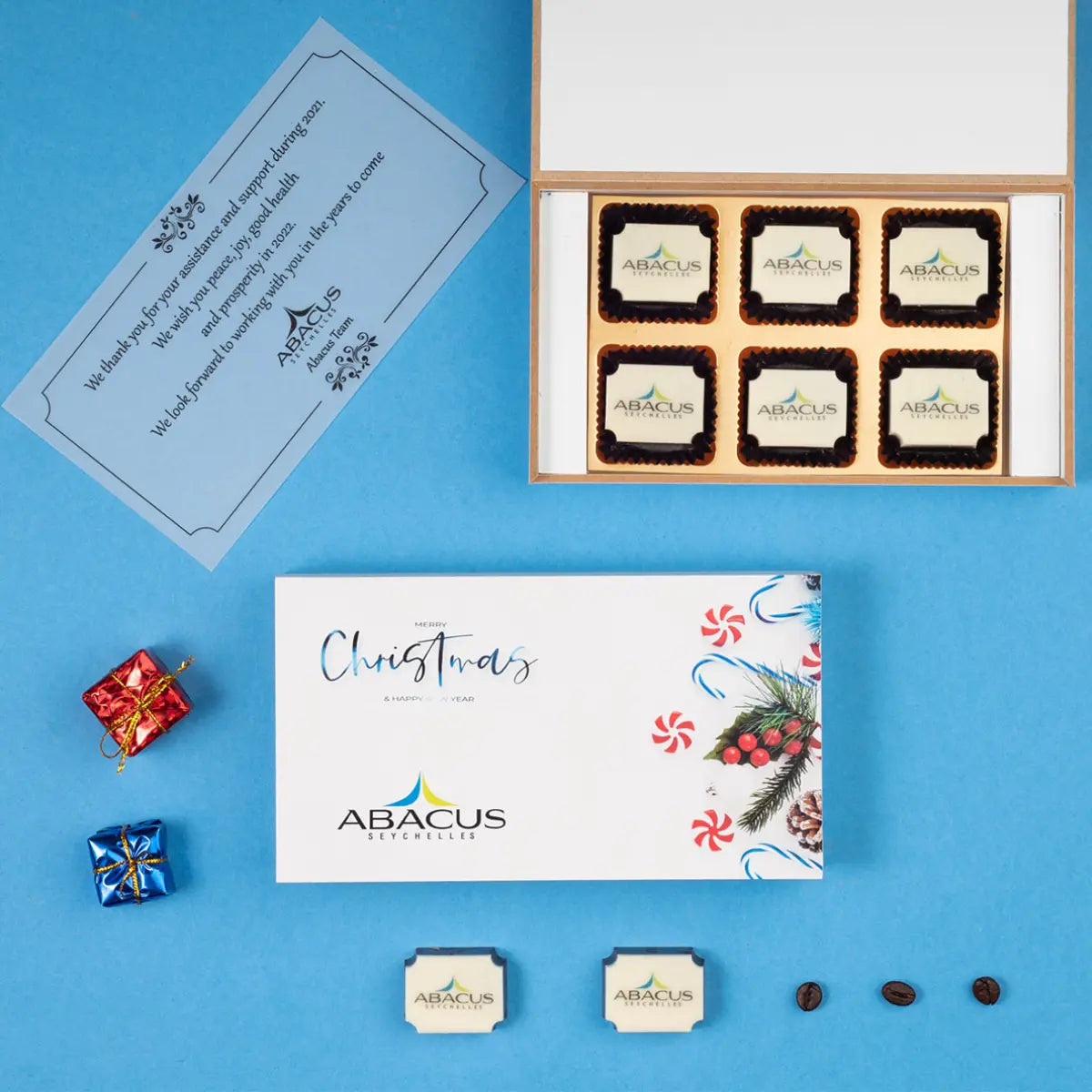 Corporate chocolate gift boxes with printed chocolates by ChocoCraft