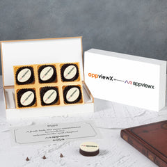 Branded launch event gift box with printed chocolates and personalized message for clients and partners