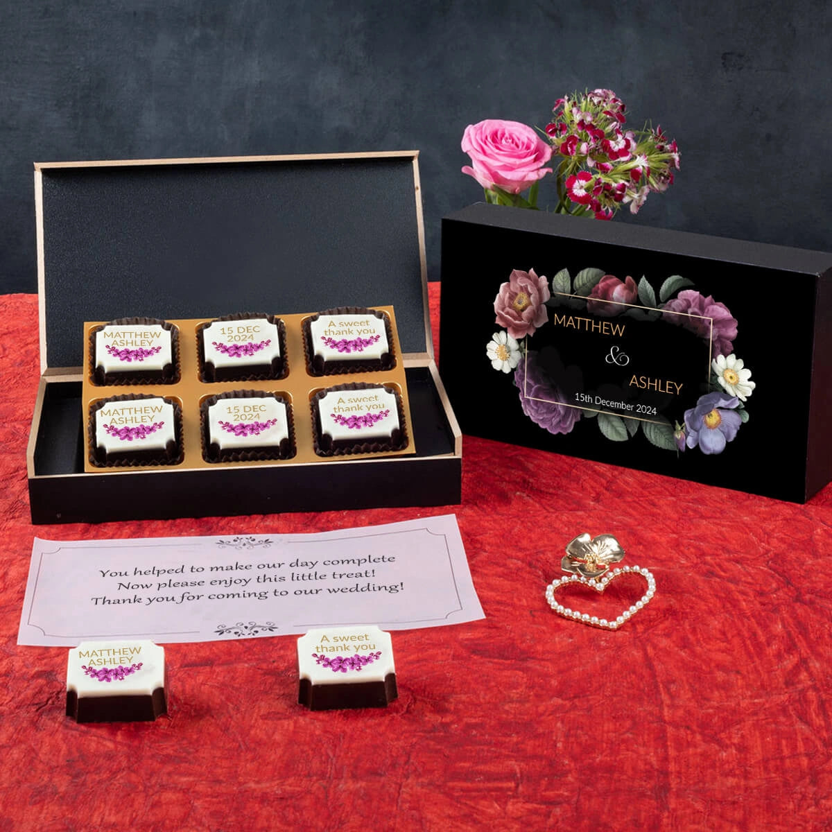 Close-up of wedding favor chocolate printed with couple names