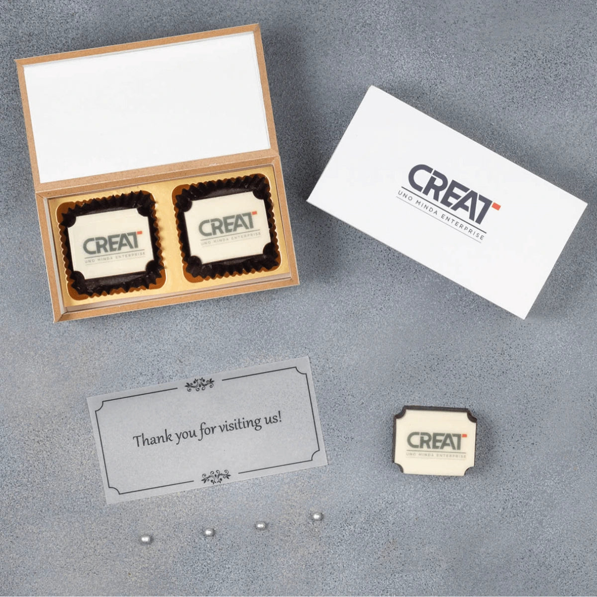 Custom chocolate gift boxes with printed chocolates by ChocoCraft