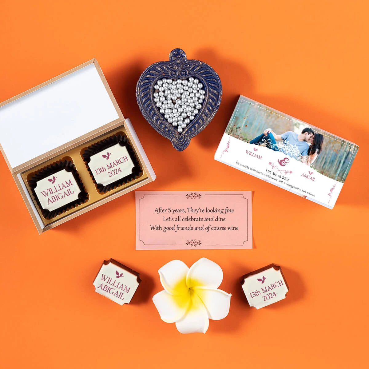 Custom anniversary invitation with photo and chocolates