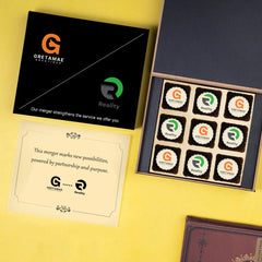 Branded gift box with butter paper message and logo chocolates for M&A 