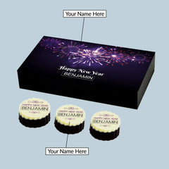 Detail view of happy new year gifts with custom message inside wooden gift box for coworkers