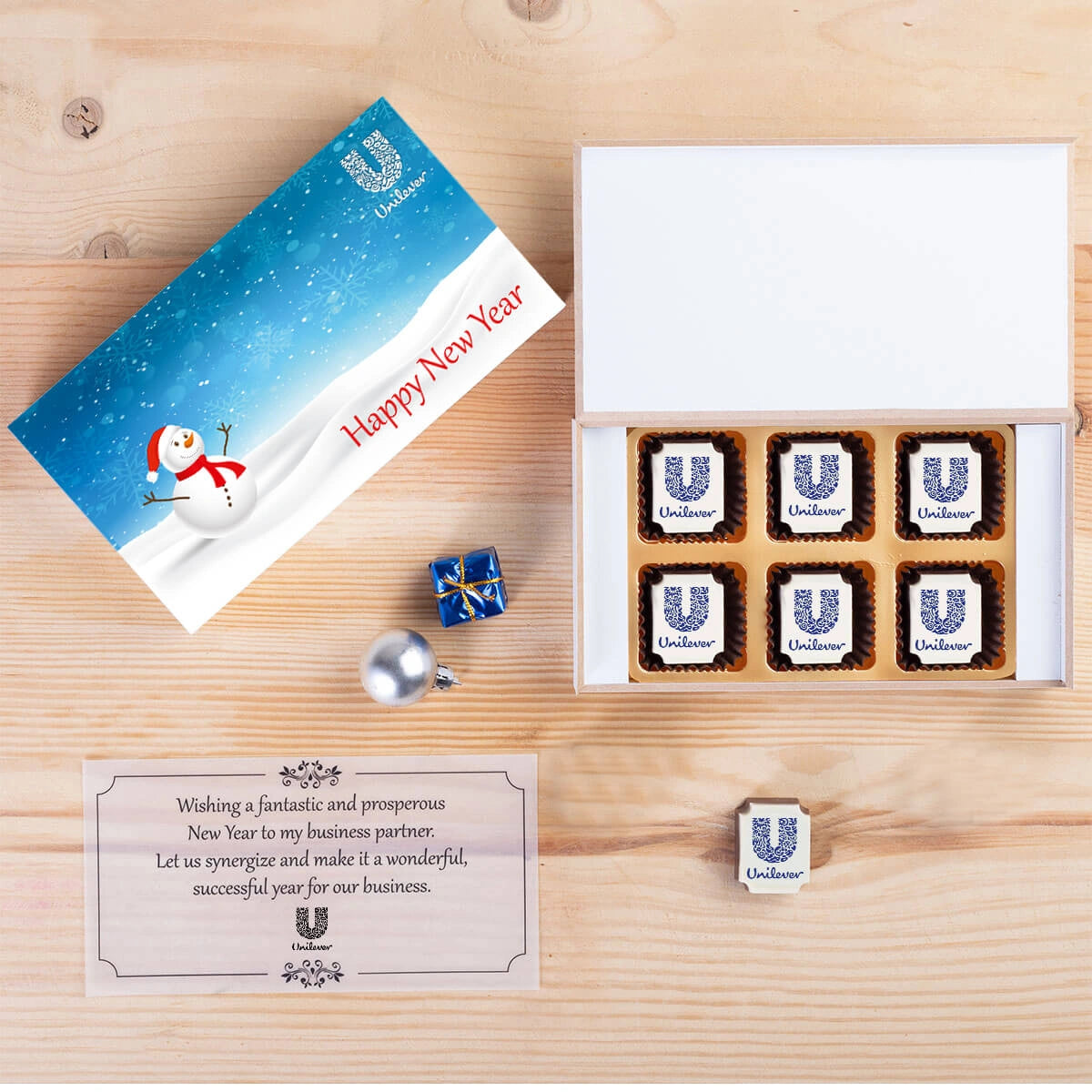 White wooden box of New Year corporate chocolates