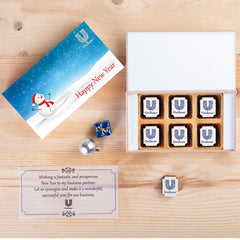 White wooden box of New Year corporate chocolates