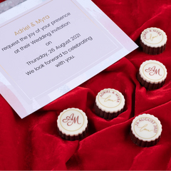 Personalized butter paper message for 9-piece chocolate wedding invite
