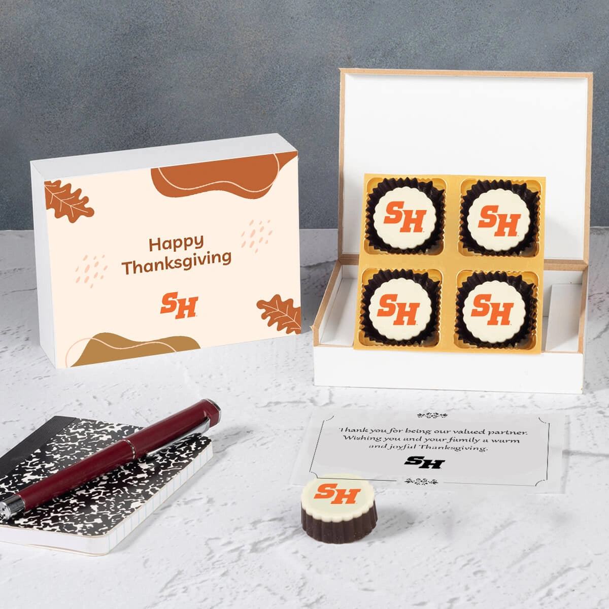 Personalized staff gift box with four logo-printed chocolates for employee appreciation