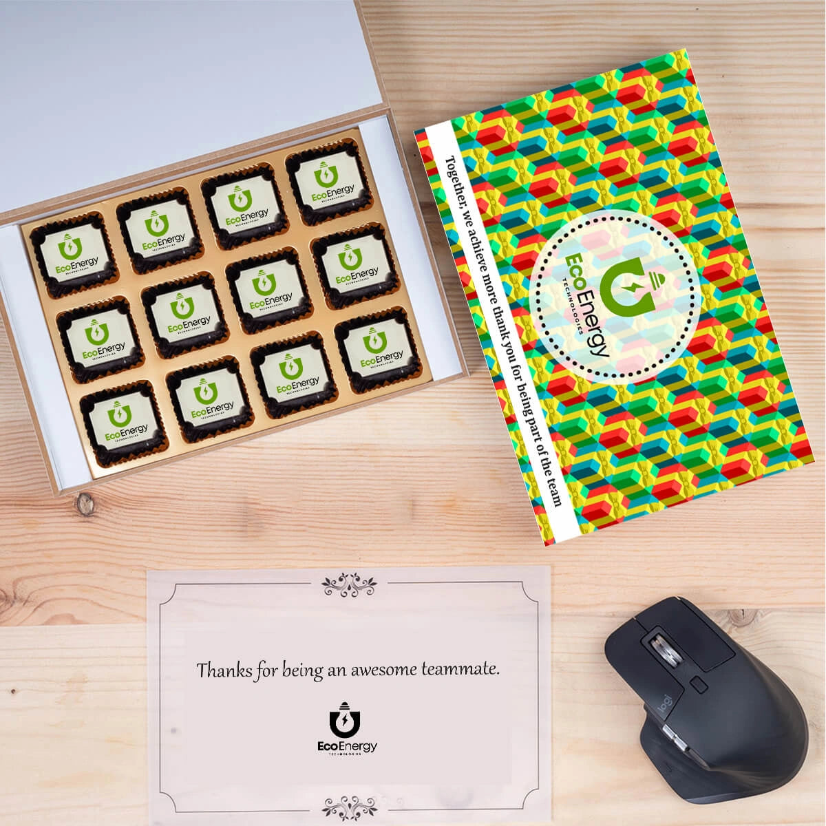 Team-building event gift box filled with branded chocolates and note