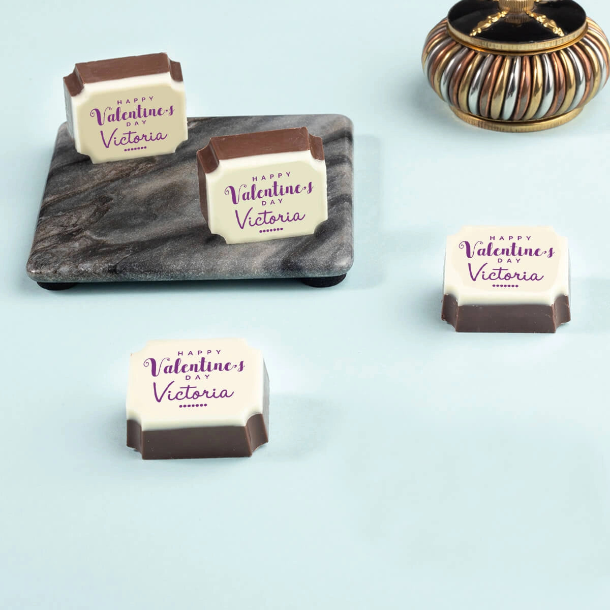 Detail view of valentines chocolate box with custom message inside wooden gift box