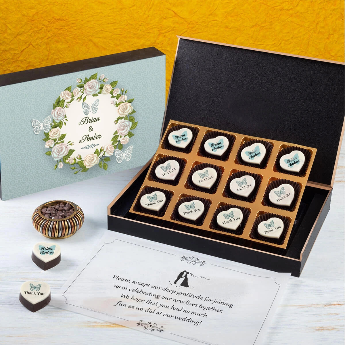 Black luxury box with twelve custom printed wedding chocolates