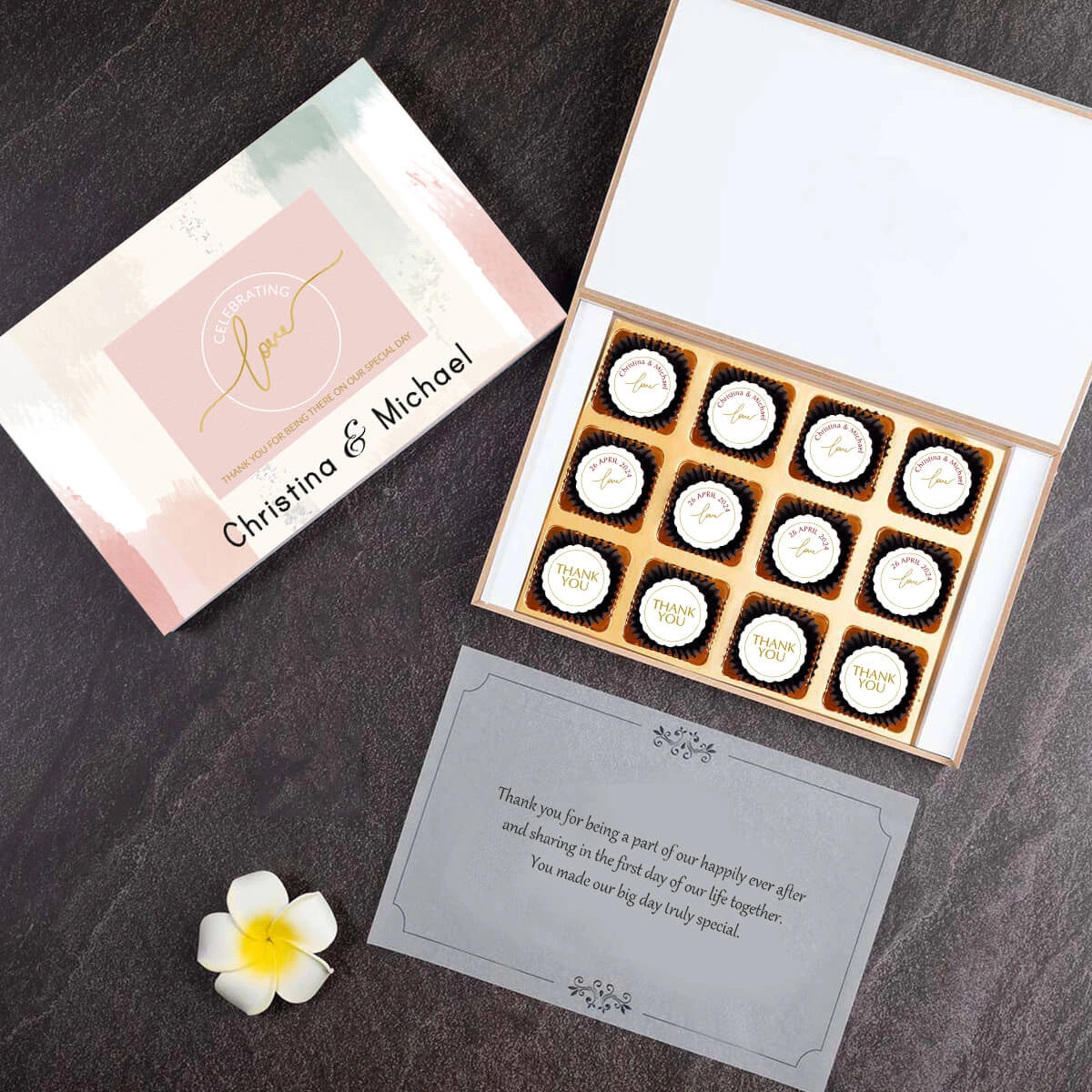 Neatly arranged twelve chocolate wedding favors inside box