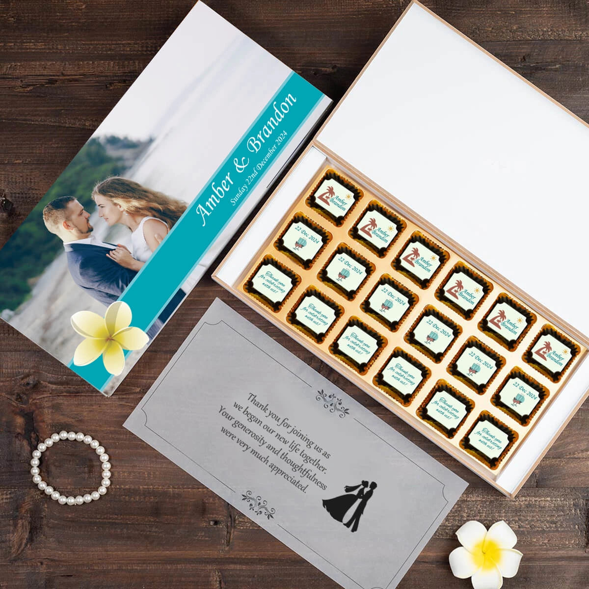 White wooden box with eighteen chocolates for wedding favors