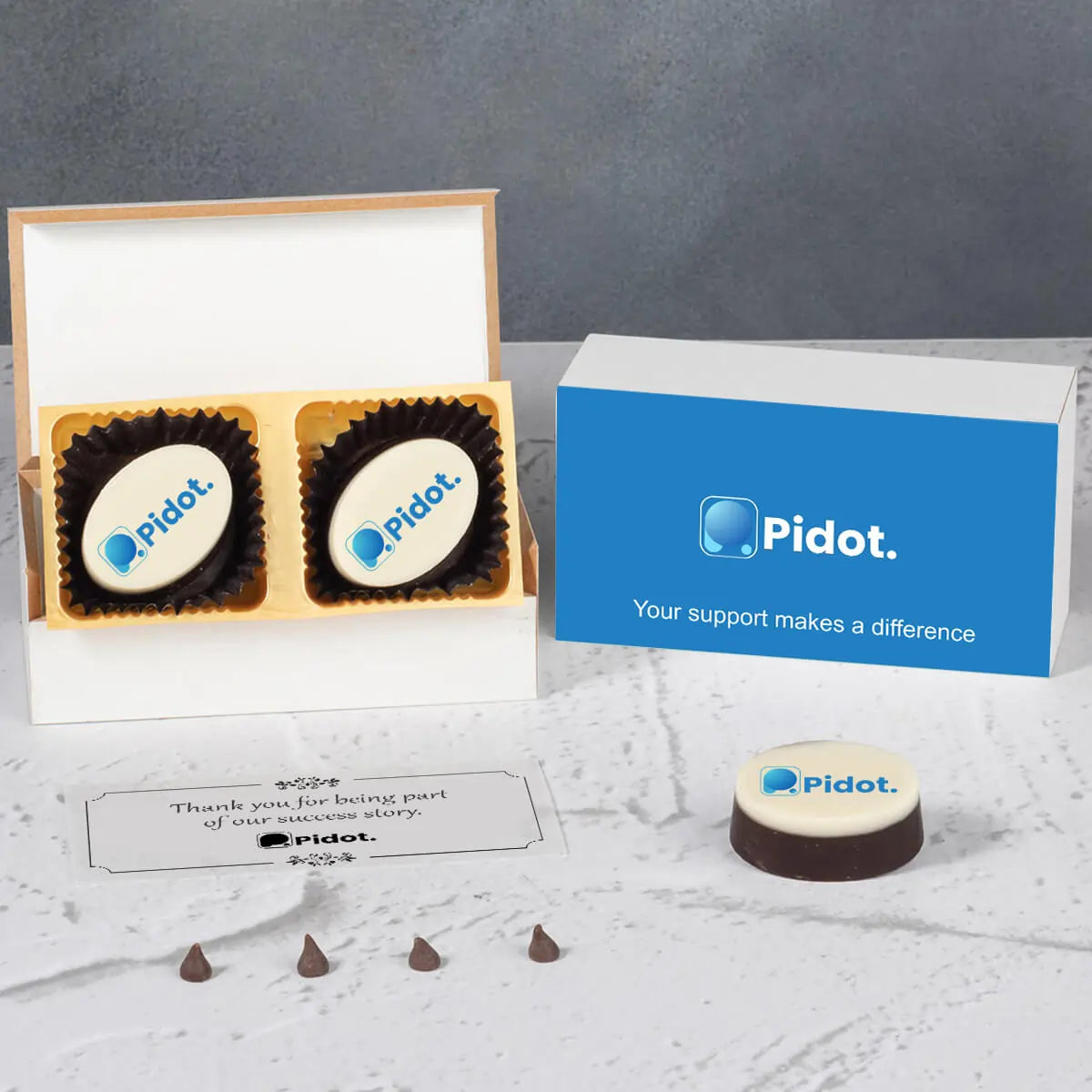 White wooden box with nine logo chocolates for appreciation gifts