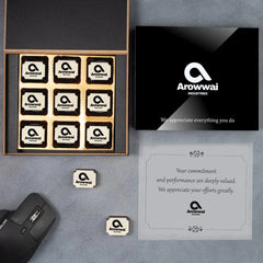 Open wooden box with six logo chocolates for distributor appreciation